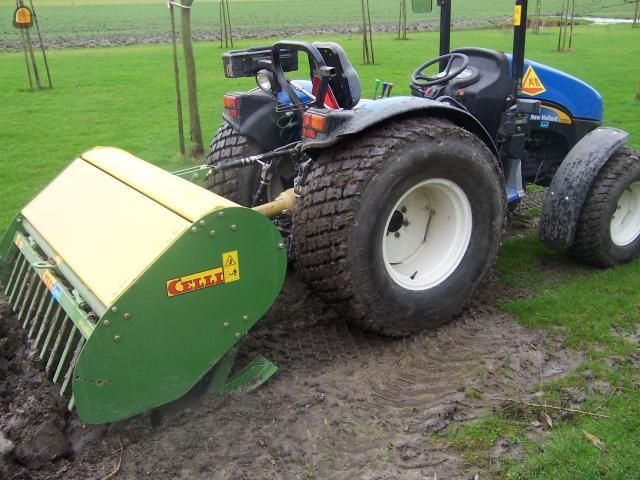 Tractor + grondfrees Nh tce 1.6m+celli spitmachine